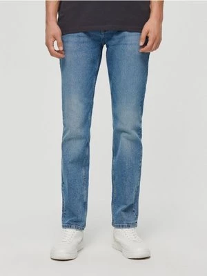 Jasnoniebieskie jeansy straight fit z przetarciami House