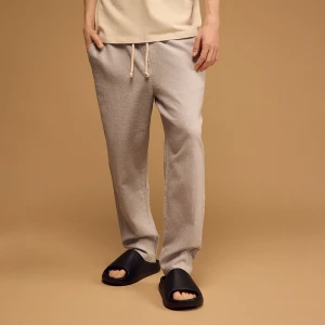 Jasnoniebieskie spodnie carrot fit z lnem House