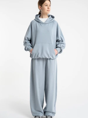 Jasnoniebieskie spodnie dresowe OVERSIZE bez nadruków Reporter