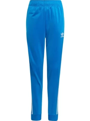 Jasnoniebieskie spodnie dresowe z ikonicznymi paskami Adidas Originals