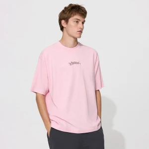 Jasnoróżowa koszulka z napisem w stylu graffiti House