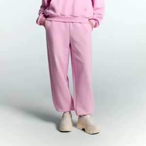 Jasnoróżowe spodnie dresowe z wysokim stanem House