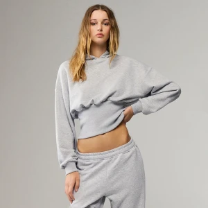 Jasnoszara bluza z kapturem i szerokim ściągaczem House