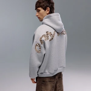 Jasnoszara bluza z nadrukiem Only Vision na plecach House