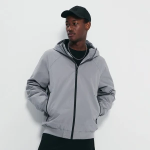 Jasnoszara kurtka przejściowa z kapturem House