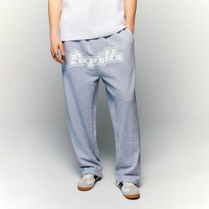 Jasnoszare spodnie dresowe z nadrukiem Synth House