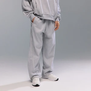 Jasnoszare spodnie skater fit z białym lampasem House