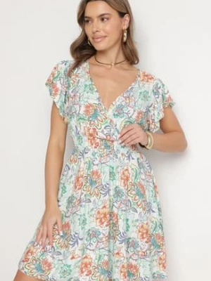 Jasnozielona Bawełniana Sukienka w Kwiaty z Kopertowym Dekoltem Rozkloszowana Jenovienna defox