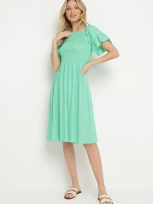 Jasnozielona Rozkloszowana Sukienka Bawełniana z Bufiastymi Rękawami i Elastyczną Górą Veliova defox