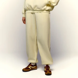 Jasnożółte spodnie dresowe jogger House