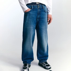 Jeansy baggy fit granatowe House