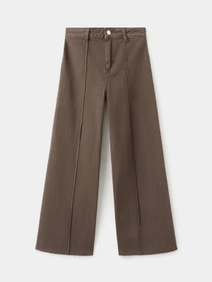 Zdjęcie produktu Jeansy bezszwowe z bawełny brązowy - Dzieci - - MANGO KIDS