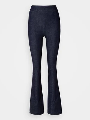 Jeansy Bootcut Calvin Klein Jeans ciemnoniebieski