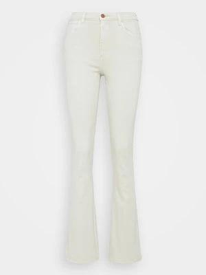 Jeansy Bootcut Wrangler mleczny