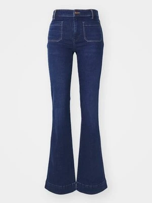Jeansy Dzwony Wrangler