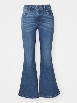 Jeansy Dzwony Wrangler