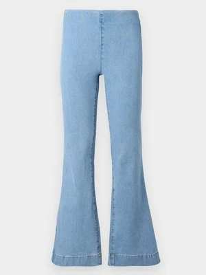 Jeansy Dzwony Wrangler niebieski denim