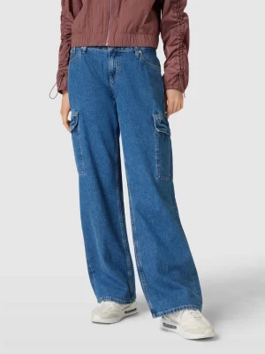 Jeansy o kroju baggy fit z bardzo niskim stanem i kieszeniami cargo Calvin Klein Jeans