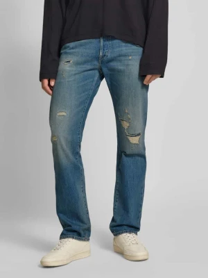Jeansy o kroju regular fit z przetarciami model ‘DERRYCK’ Replay