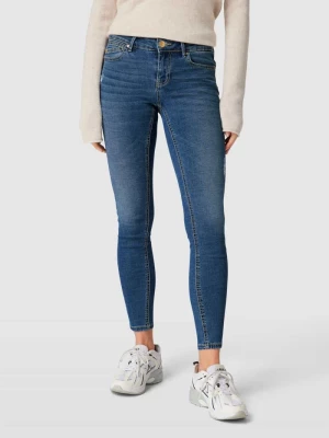 Jeansy o kroju skinny fit z efektem znoszenia model ‘ROBYN’ Vero Moda