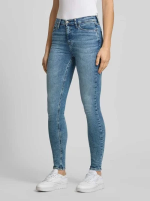 Jeansy o kroju skinny fit z mieszanki bawełny Tommy Jeans