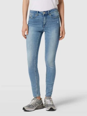 Jeansy o kroju skinny fit z przetarciami model ‘FLASH’ Vero Moda
