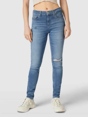 Jeansy o kroju skinny fit z przetarciami model ‘NORA’ Tommy Jeans
