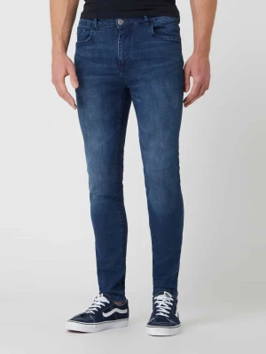 Jeansy o kroju skinny fit z zapięciem na guzik i zamek błyskawiczny REVIEW