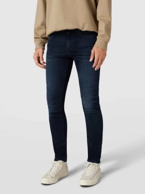 Jeansy o kroju slim fit, z detalem z logo, model ‘Layton’ Tommy Hilfiger