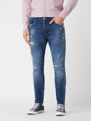 Jeansy o kroju slim fit z efektem znoszenia ELIAS RUMELIS