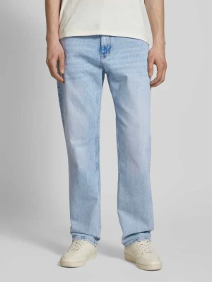 Jeansy o kroju slim fit z mieszanki bawełny z naszywką z logo model ‘RYAN’ Tommy Jeans