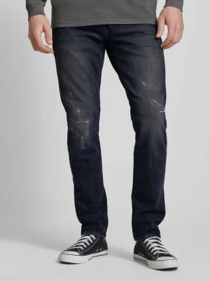 Jeansy o kroju slim fit z przetarciami G-Star Raw