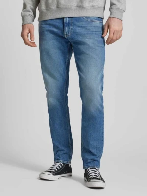 Zdjęcie produktu Jeansy o kroju slim tapered fit z 5 kieszeniami model ‘AUSTIN’ Tommy Jeans