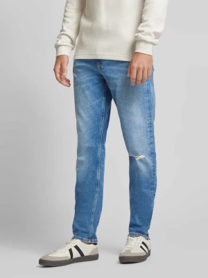 Zdjęcie produktu Jeansy o kroju slim tapered fit z przetarciami Calvin Klein Jeans