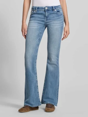Jeansy o rozkloszowanym kroju w efekcie znoszenia model 'Poppy' Gina Tricot