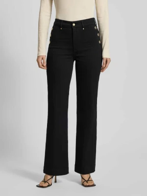 Jeansy o rozkloszowanym kroju z kieszeniami z tyłu Guess