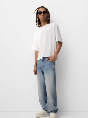 Jeansy Relaxed Fit Bershka niebieski denim