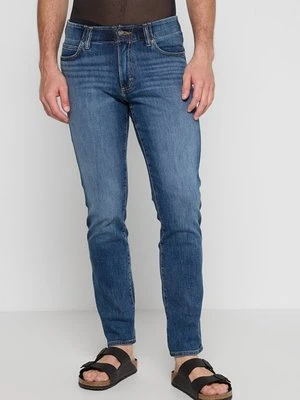 Jeansy Skinny Fit Lee niebieski denim