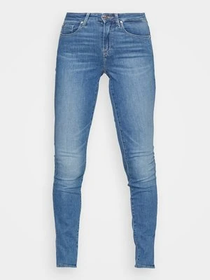 Jeansy Skinny Fit Tommy Hilfiger niebieski