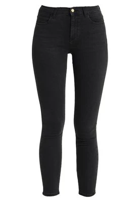 Jeansy Skinny Fit Wrangler