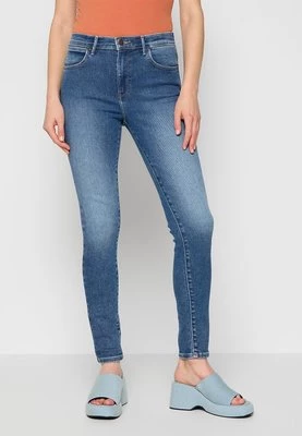 Jeansy Skinny Fit Wrangler