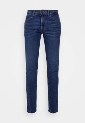 Jeansy Skinny Fit Wrangler