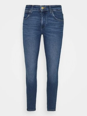 Jeansy Skinny Fit Wrangler