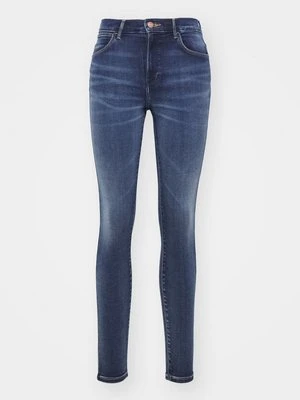 Jeansy Skinny Fit Wrangler