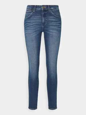 Jeansy Skinny Fit Wrangler niebieski denim