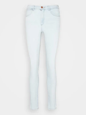 Jeansy Skinny Fit Wrangler jasnoniebieski