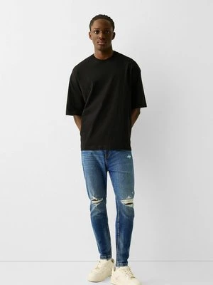 Jeansy Slim Fit Bershka niebieski denim