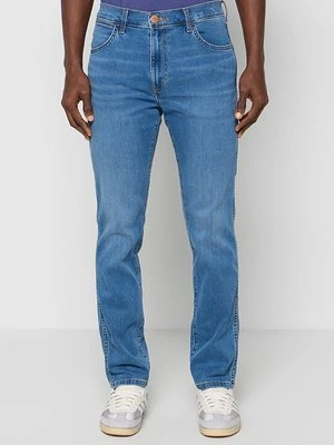 Jeansy Slim Fit Wrangler biały