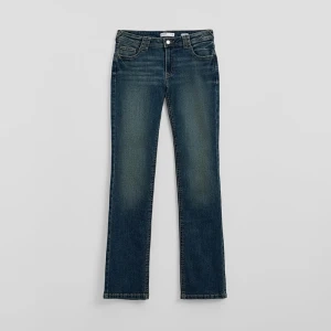 Jeansy slim fit z niskim stanem i ozdobnymi kieszeniami House indigo jeans