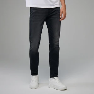 Jeansy slim fit z przetarciami czarne House